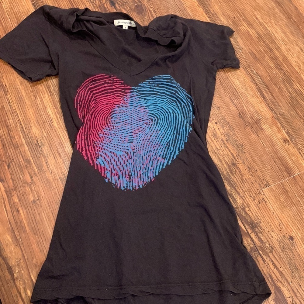 Dark grey graphic T-shirt.